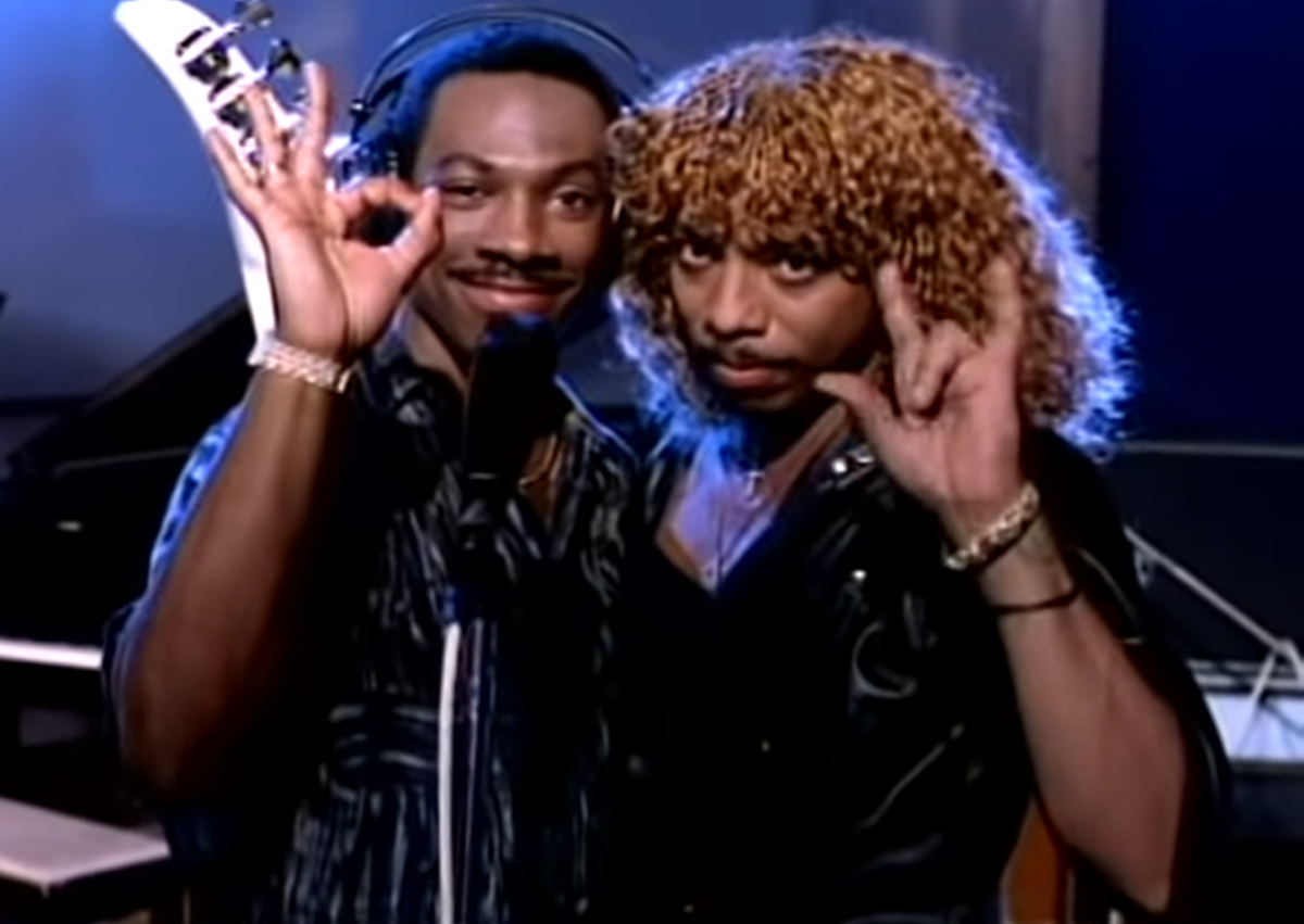 Eddie Murphy in his iconic Party All the Time pose from Beverly Hills Cop